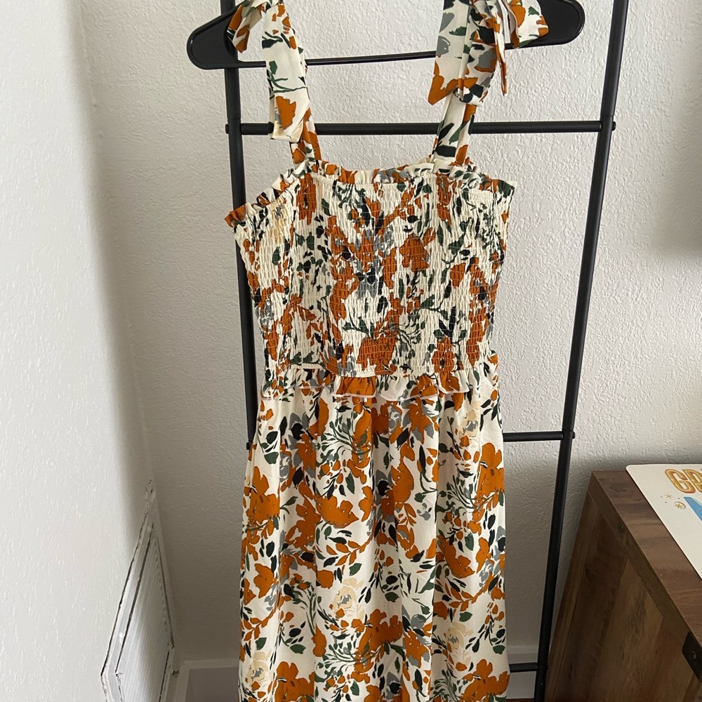 Mid length sun dress. Ruched top. Worn once.